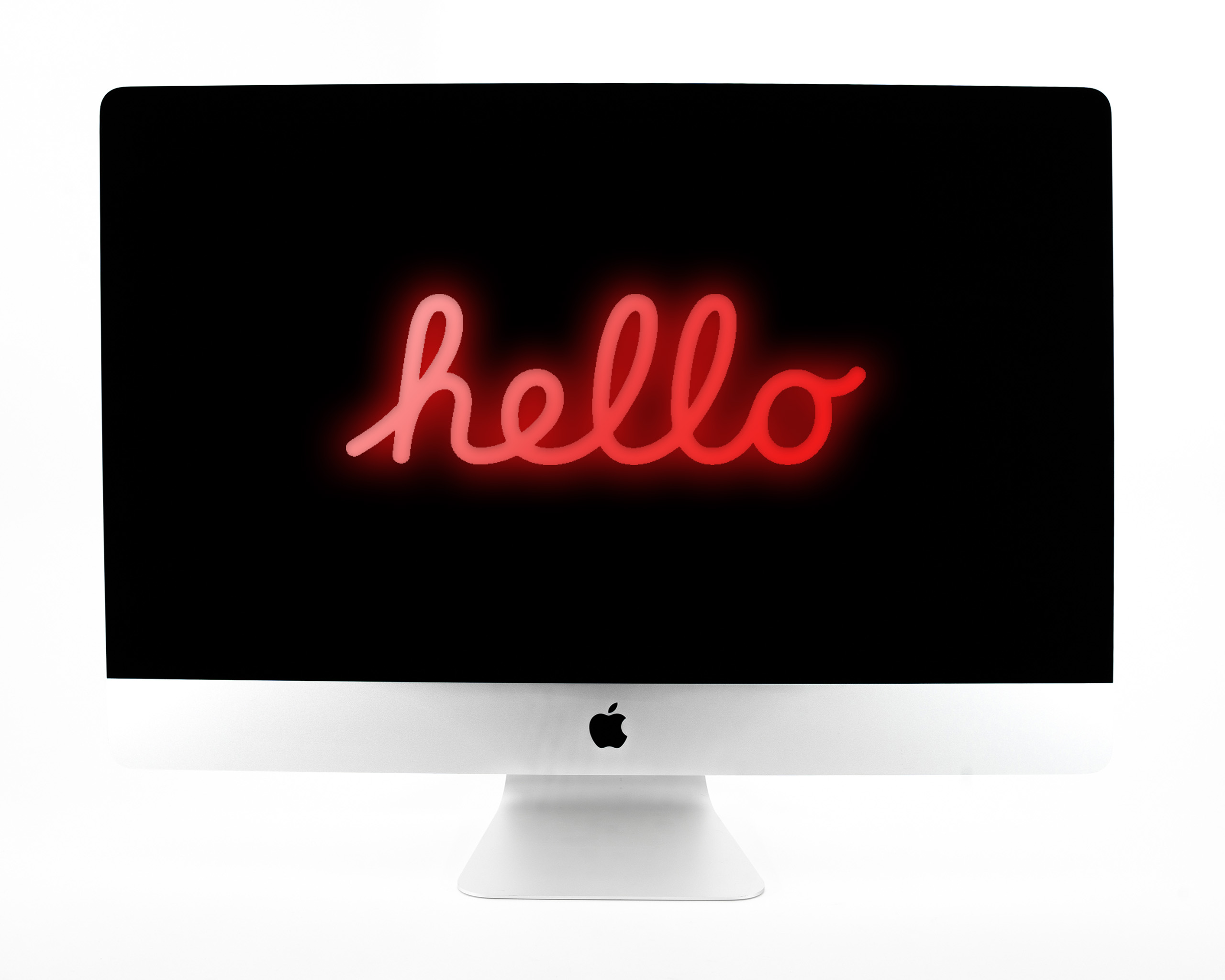 iMac 27" z czerwonym neonowym napisem Hello na ekranie